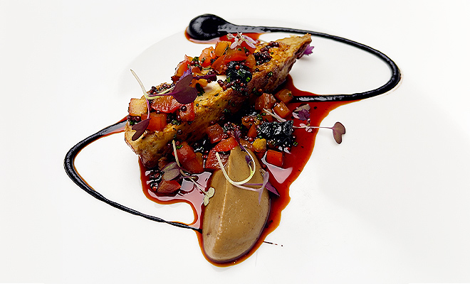 An Image of Adam Handling MBE / his food at Signature Food Festival 2024