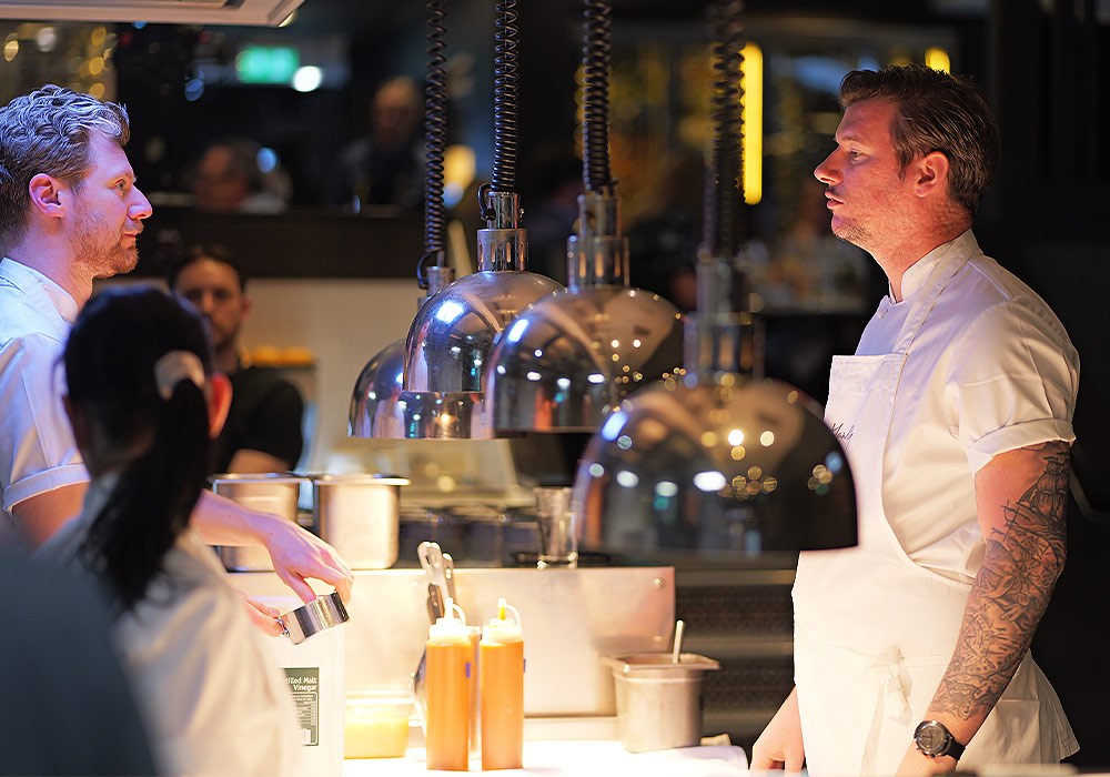 An Image of Adam Handling MBE / his food at Signature Food Festival 2024